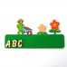 Türschild aus Holz  Motiv Frosch mit Schubkaren mit Buchstaben